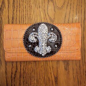 Orange croc-embossed wallet with FLeur-de-Lis accent